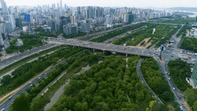 City with Lush Park and Bridge