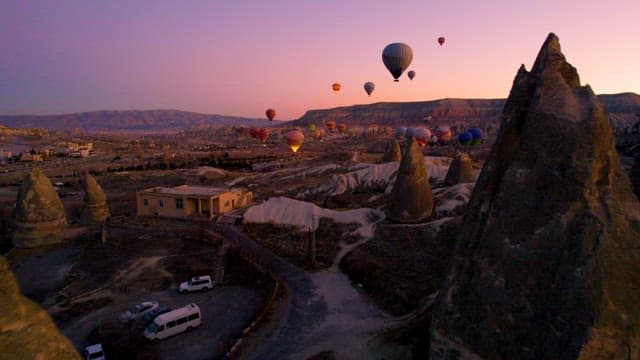 Hot Air Balloon over Picturesque Cappadocia at Dusk