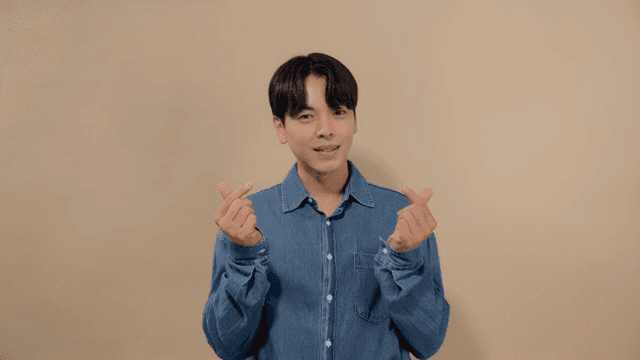 Man making various hearts with his hands to express his love