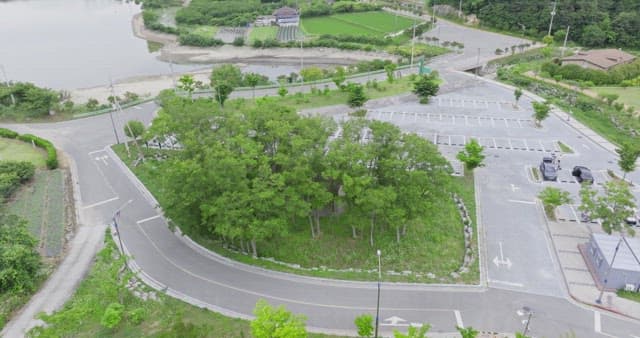 View of a park with parking lot