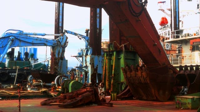 Bustling Activity at an Industrial Shipyard