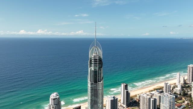 Coastal Cityscape with Skyscrapers and Beach