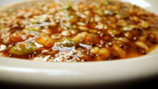 Thick and glossy grain syrup with whole grains