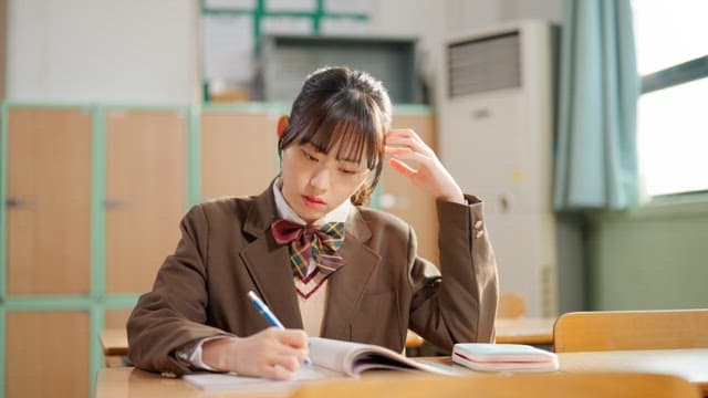 Student studying in a classroom