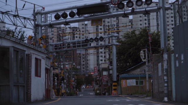 Dusk at a Quiet Urban Railroad Crossing
