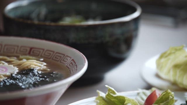 Bowl of Steaming Ramen with Toppings
