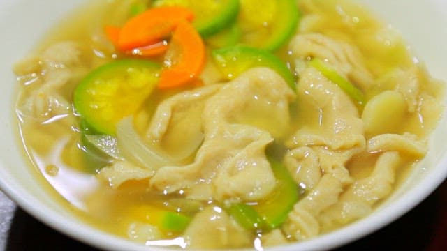 Appetizing handmade sujebi with vegetables and wheat dough