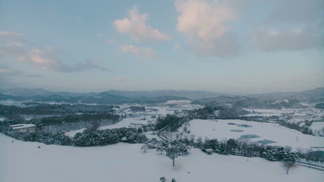 Serene Snow-covered Landscape at Dusk