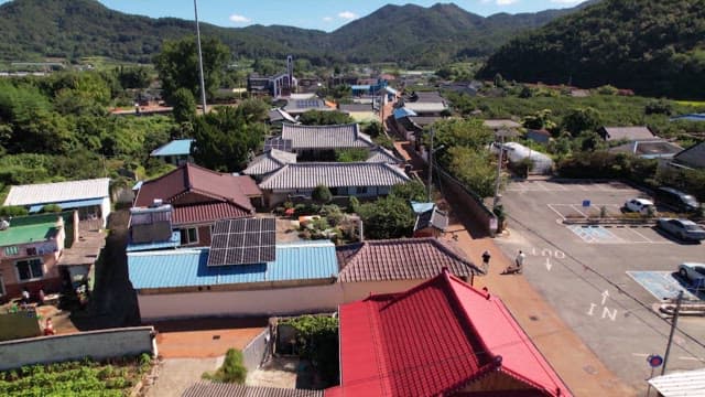 Scenic rural village surrounded by mountains and farmlands