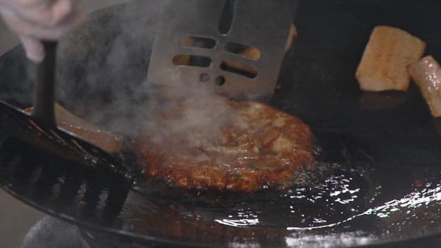 Cooking pancakes on a hot oiled pan