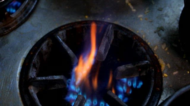 Ginseng chicken soup boiling in a pot on a stove
