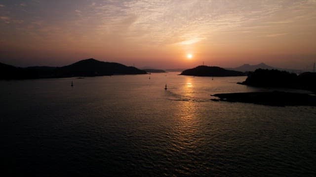 Serene Sunset Over a Coastal Landscape