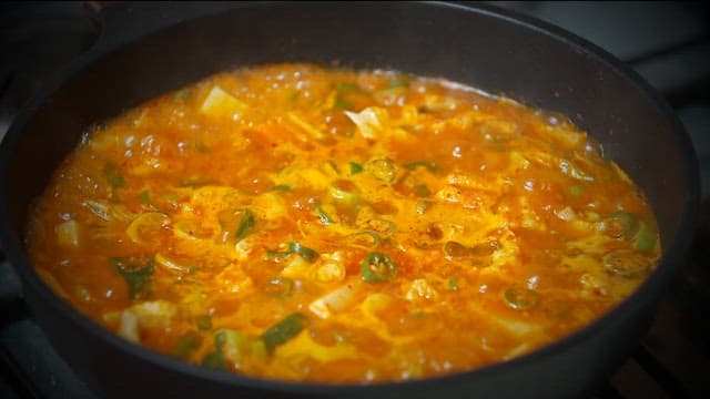 Braised radish boiling in a pot