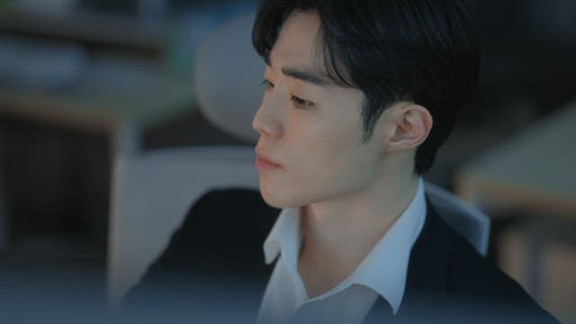 Focused man working at a desk