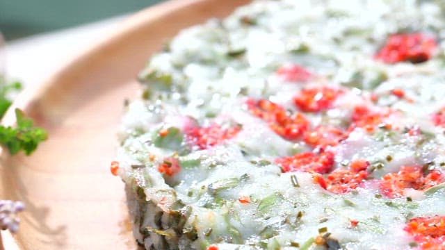 Freshly prepared colorful berry pizza on wooden board