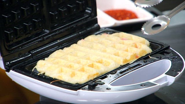 Crispy potato waffles baked in a waffle maker