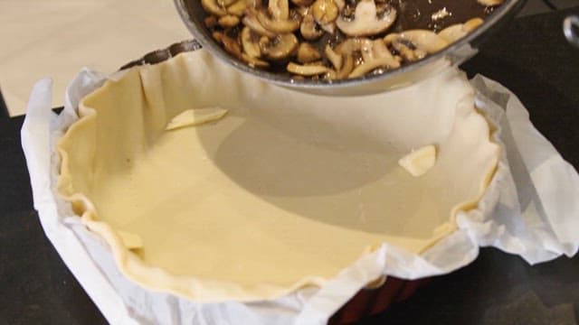 Preparing a Mushroom Quiche in the Kitchen