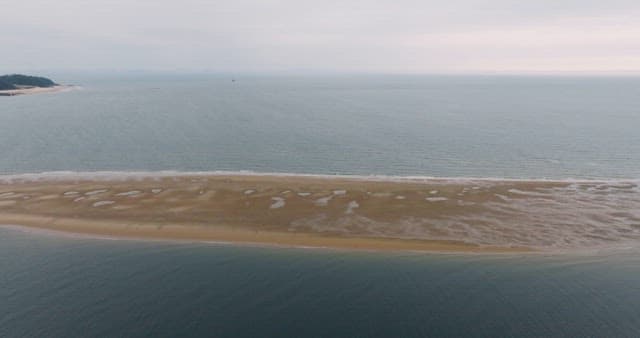 Sandbank Exposed in the Middle of the Sea