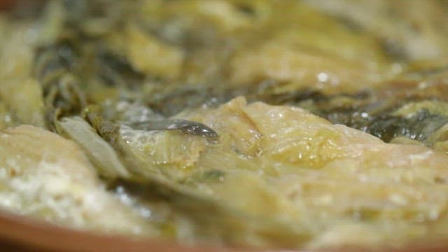Korean style fermented kimchi stew boiling in a pot