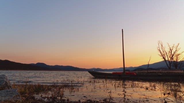 Sunset river with a ferry boat