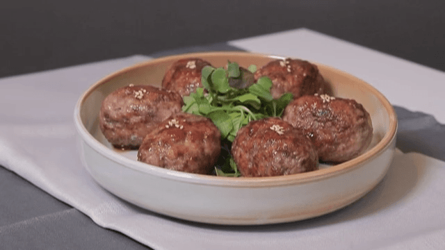 Beautifully plated grilled short rib patties