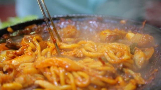 Udon noodles served on his own plate