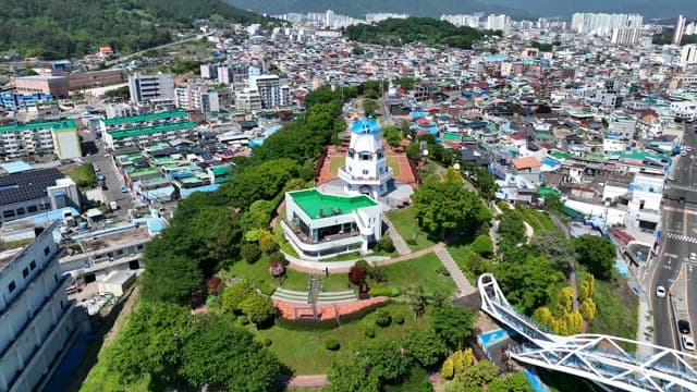 Cityscape with a park and windmill