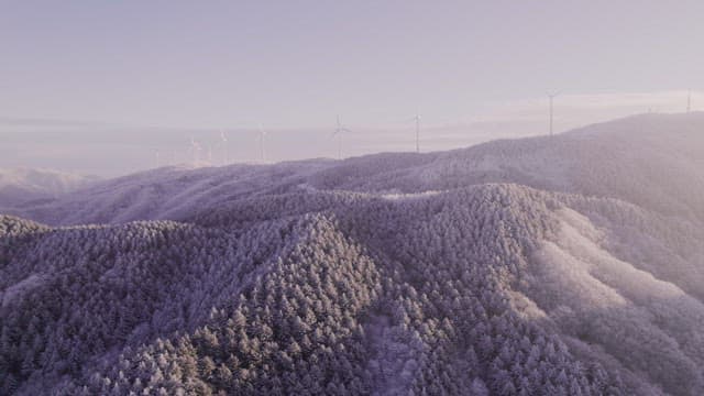 Snow-Covered Mountain Landscape at Dawn