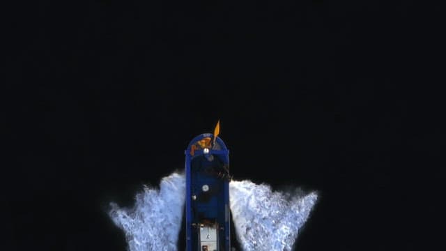 Boat moving swiftly through the sea