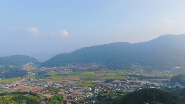 View of a rural village and farmland