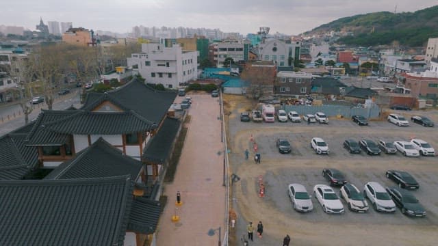 Traditional Korean Hanok Village with a view of the parking lot