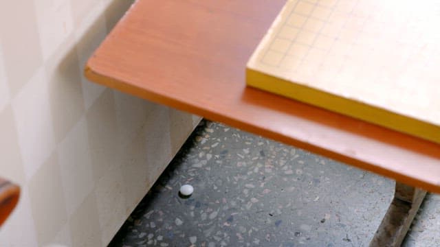 Go board on a wooden table indoors