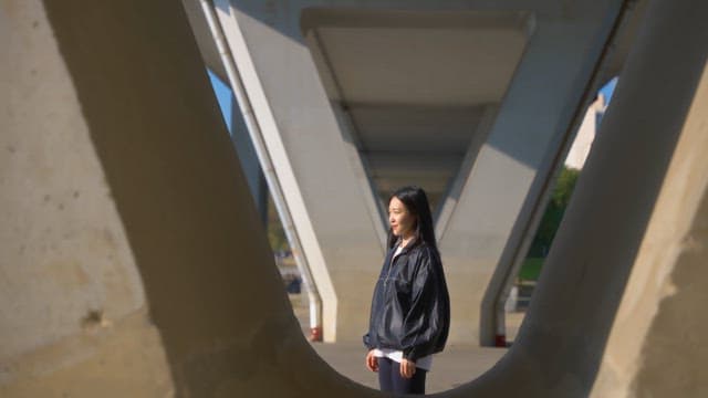 Woman stretching in a sunny park