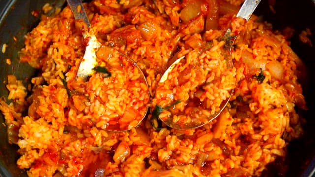 Lettuce added to spicy fried rice