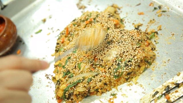 Korean griddled fried rice with sesame seeds