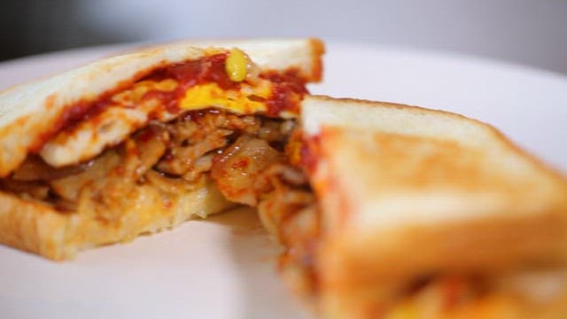 Korean sandwich with egg, sauce and pork bulgogi