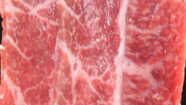 Succulent Raw Marbled Meat Slices