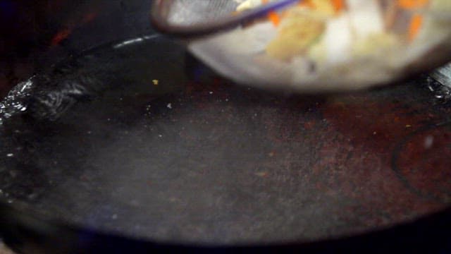 Cooking Various Ingredients in a Hot Wok