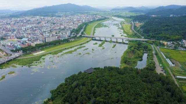 Urban and Nature Harmony with River and Cityscape