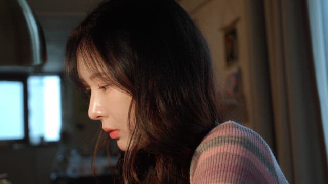 Woman focused on her work indoors