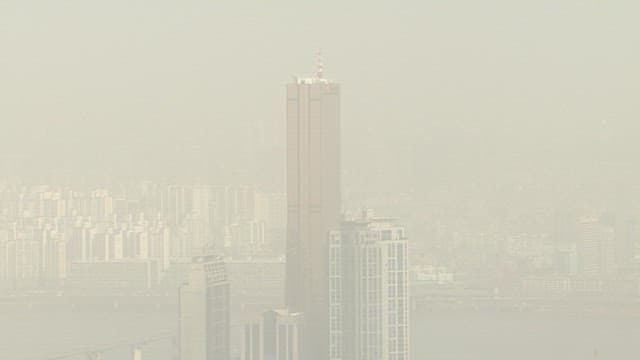 Urban Landscape in the Air Hazy with Fine Dust