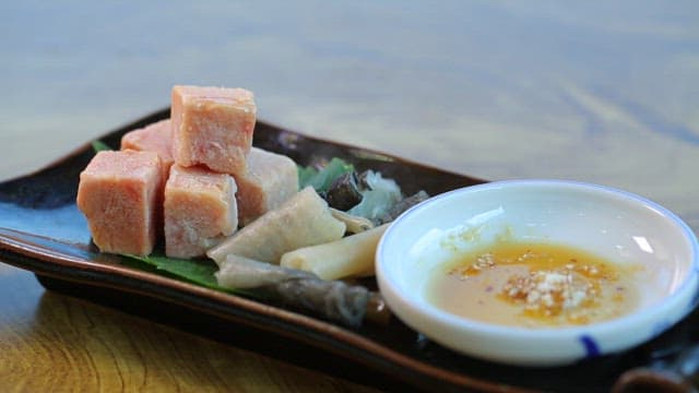 Fresh skate liver and skin plated with oil sauce