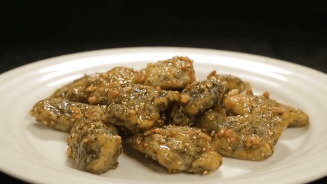 Gangjeong made with beeswax rice cakes served on a white plate