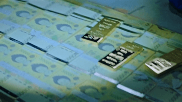 Close-up shots of a secret cash stash