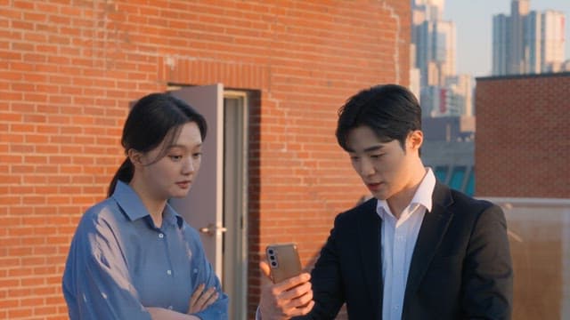 Two colleagues discussing on a rooftop