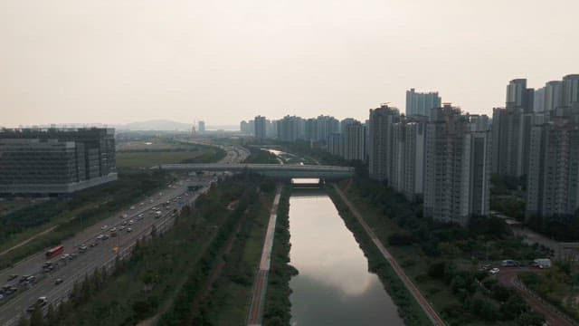 Cityscape with river and highway