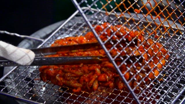 Grilled webfoot octopus grilled on the grill