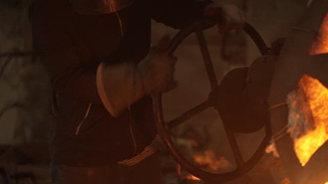 Worker operating machinery in a factory