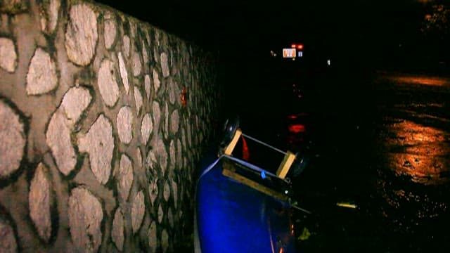 Stone wall on a rainy night