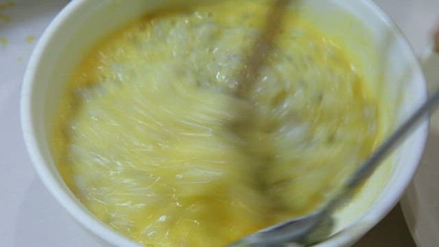 Placing the Octopus Pancake Batter on an Oiled Pan